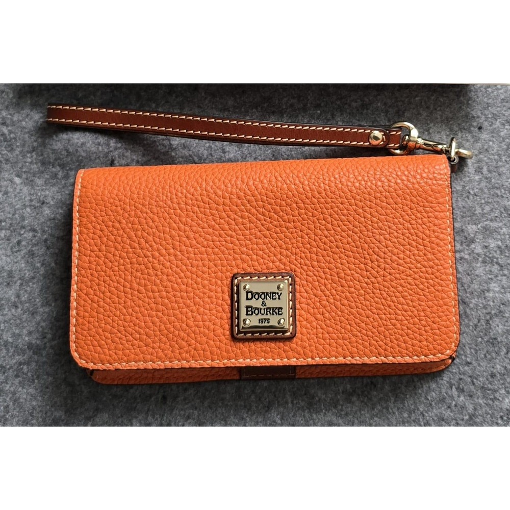 Dooney & Bourke Slim Phone Case Pebble Grain Flap Wristlet Orange Clementine EUC